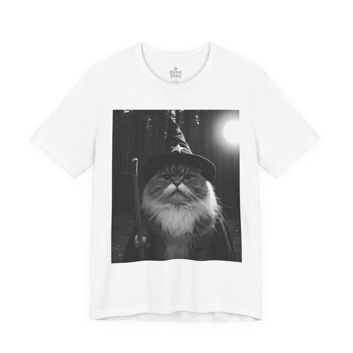 White Wizard Cat Tee, front view with a grayscale fluffy cat in a wizard hat against a moonlit forest.